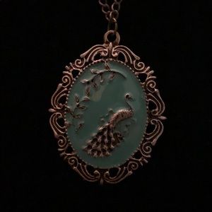Ornate teal colored Peacock necklace